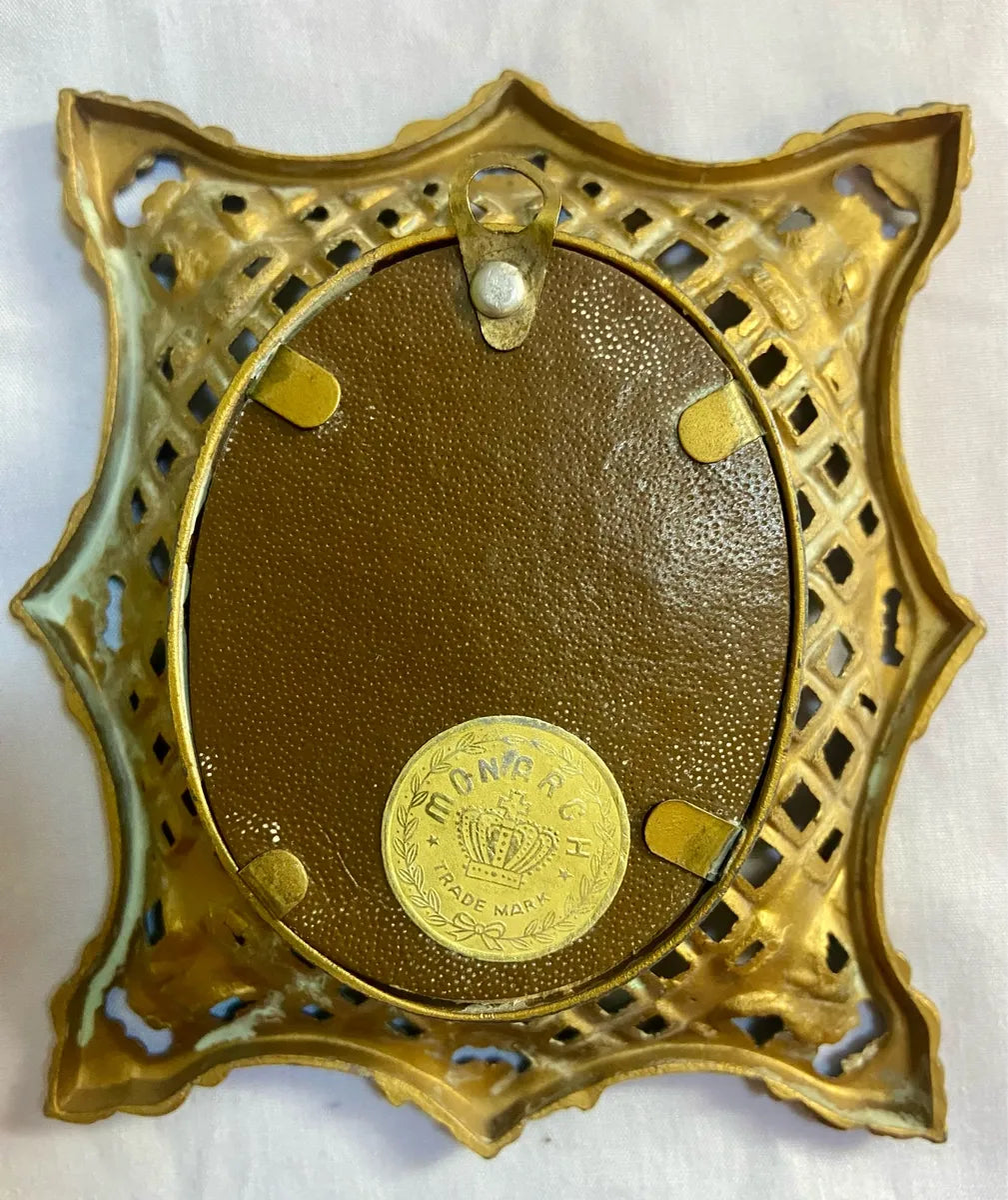 Bookshelf Art: Monarch Trade Mark Pierced Gilt Brass Cameo Portrait Frame