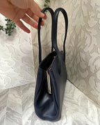 Bags: Blue Top Handle Bag with Central Gold Clasp Frame
