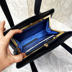 Bags: Blue Top Handle Bag with Central Gold Clasp Frame